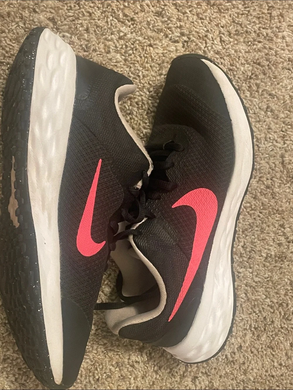Nike Black Sneakers with Pink Swoosh Accents